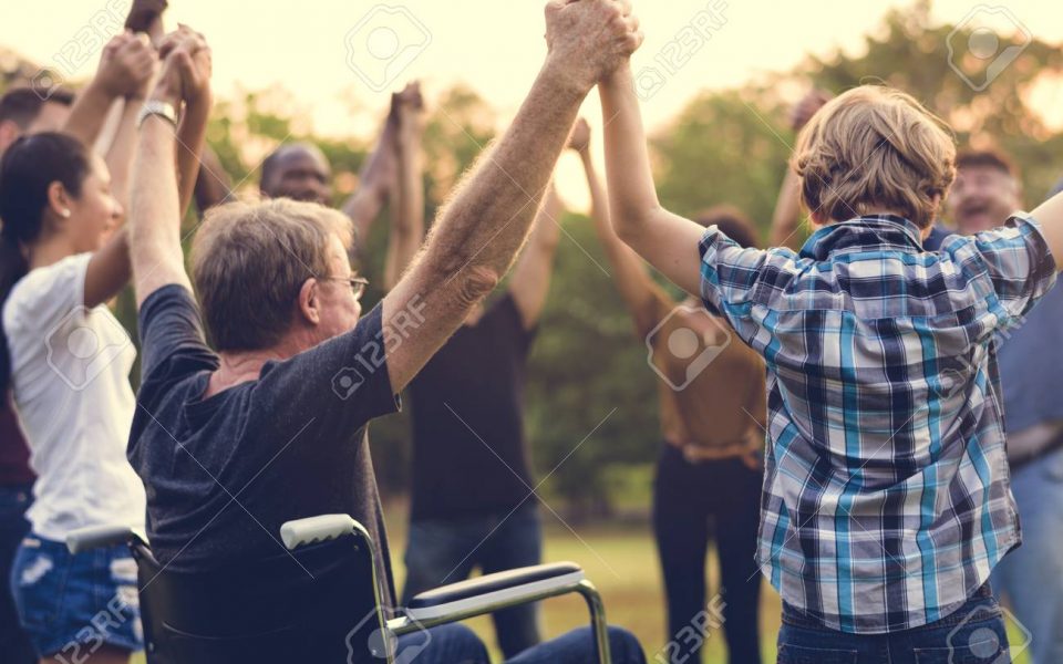 Group of people holding handssupport team unity Group of people holding handssupport team unity